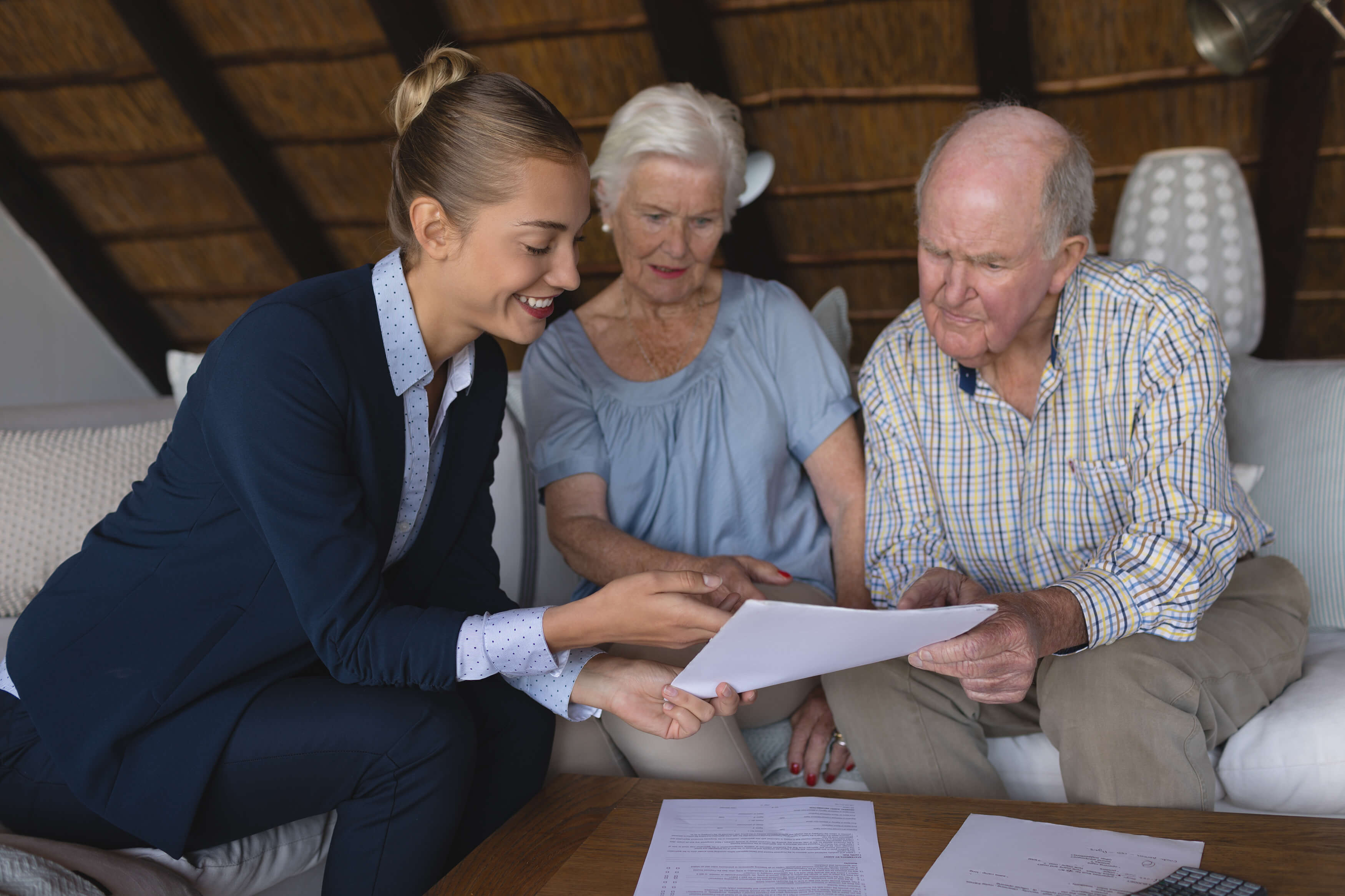 female-doctor-and-senior-couple-looking-and-discus-2023-11-27-05-18-05-utc.jpg